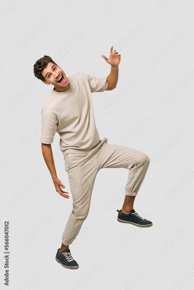 Young caucasian man jumping isolated on white background Young caucasian man jumping isolated on white background
