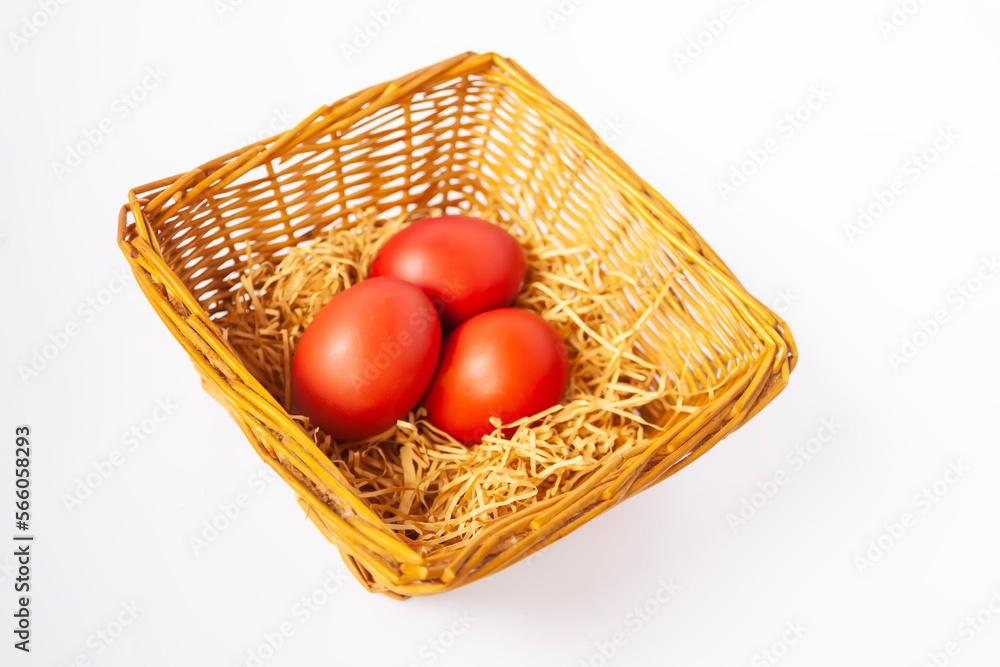 Colorful Easter eggs in a basket. Traditional festive decor. Colorful Easter eggs in a basket. Traditional festive decor.