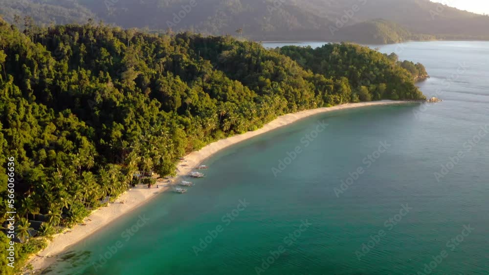 Tourist boats on duli Beach in El Nido area of Palawan Island Philippines. Amazing nautre view with island, forest and blue sea water. Aerial view Tourist boats on duli Beach in El Nido area of Palawan Island Philippines. Amazing nautre view with island, forest and blue sea water. Aerial view