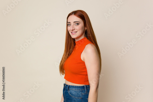 Young red hair woman isolated confident keeping hands on hips.
