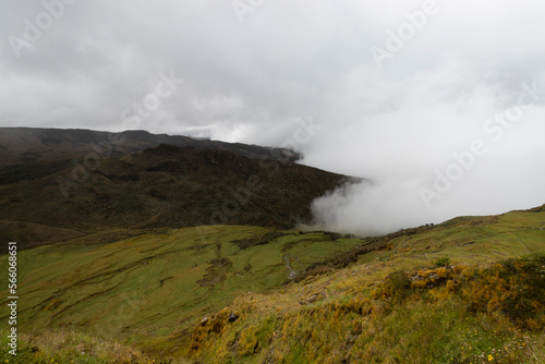 Stunning paramo ecosystem landscape with clouds and green grass
