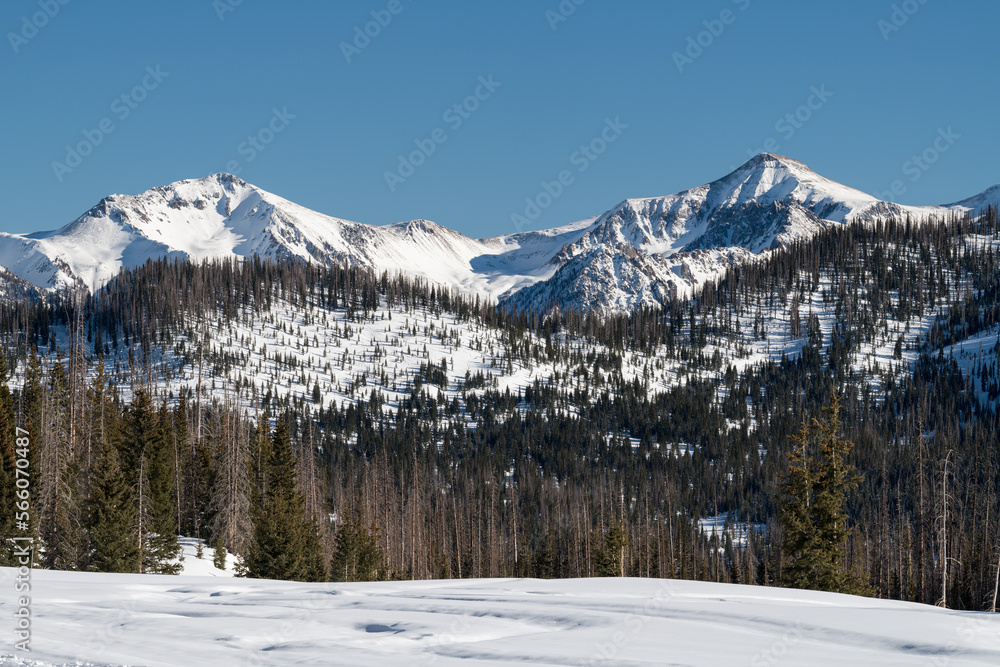 Snow Capped High Mountain Peaks are Backdrops to Wolf Creek Ski Area, Colorado. The San Juan Mountains receive generous amounts of snow, that provides great Winter recreation. 