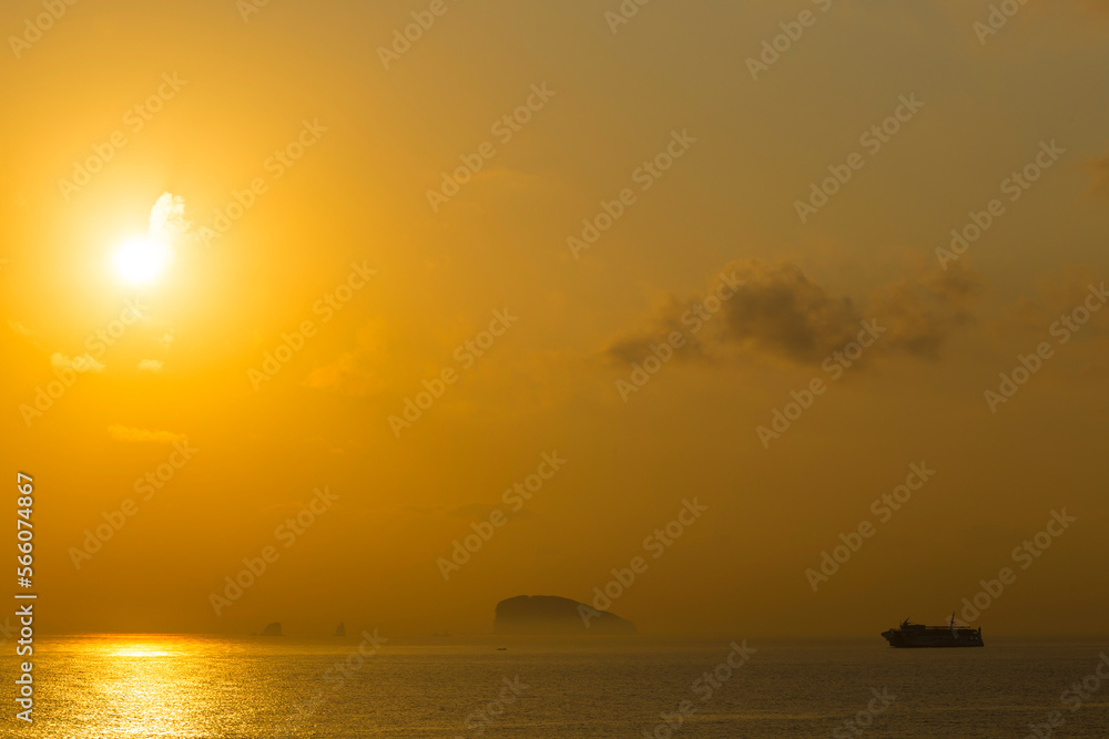 Ferry and small island near the coastline of Bali. Indonesia. Ferry and small island near the coastline of Bali. Indonesia.