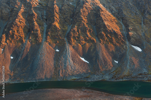 Myrktjorna at the base of the eroding slopes of Gullichsenfjellet near the Polish research station of Baranowka, Svalbard.