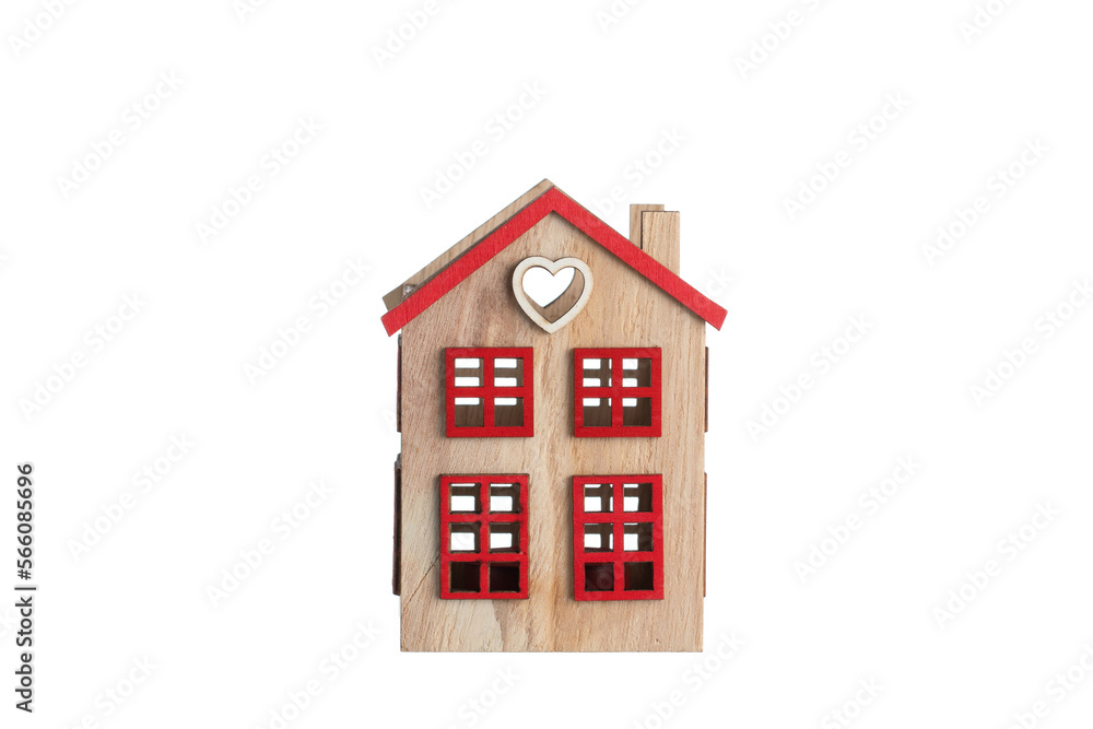 Wooden house on a white background.
Candlestick in the shape of a house.