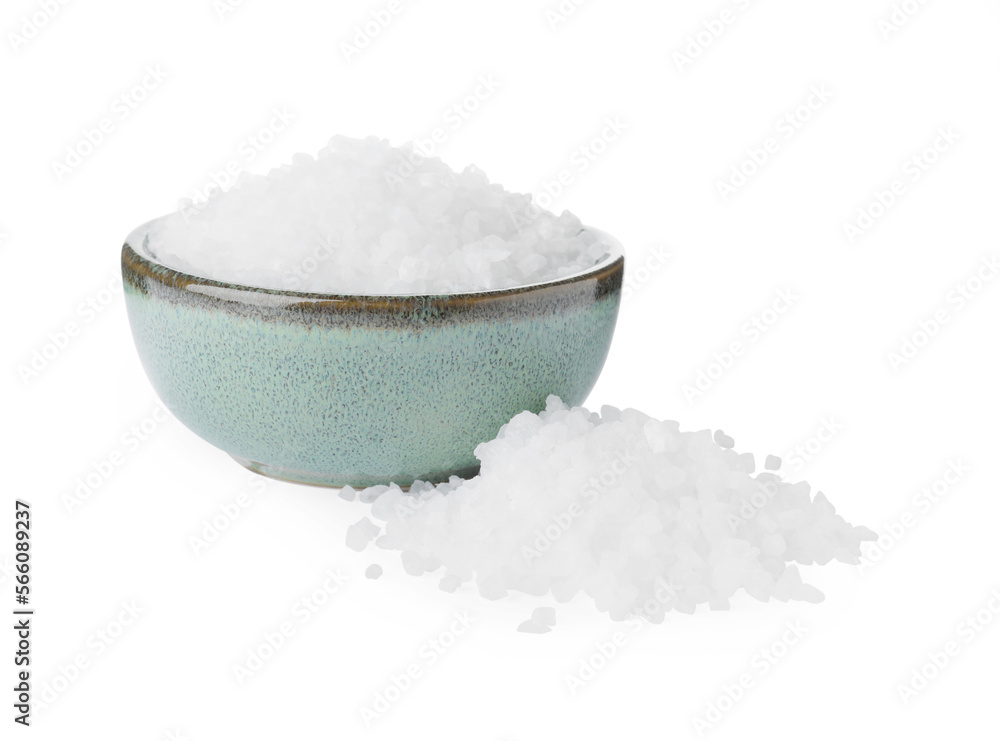 Ceramic bowl and heap of natural sea salt isolated on white Ceramic bowl and heap of natural sea salt isolated on white