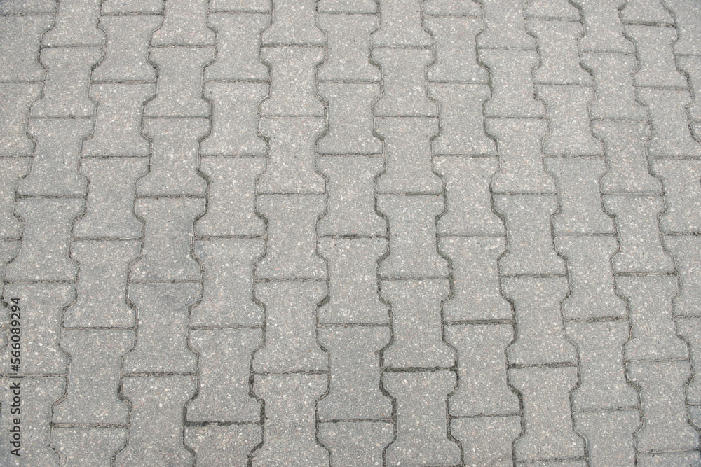 View on stone sidewalk, top view. Footpath covering View on stone sidewalk, top view. Footpath covering