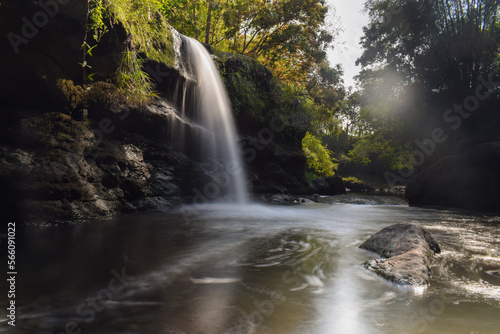 Fototapeta Naklejka Na Ścianę i Meble -  Tropical landscape. Beautiful hidden waterfall in rainforest. Slow shutter speed