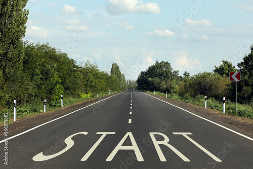 New beginnings. Word Start on asphalt road outdoors