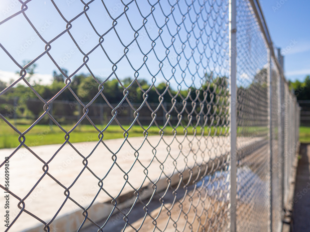 A selective focus shot of mesh fence A selective focus shot of mesh fence