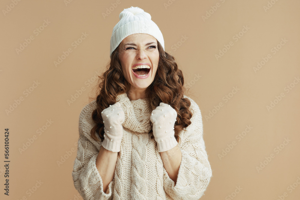 smiling elegant woman on beige background smiling elegant woman on beige background