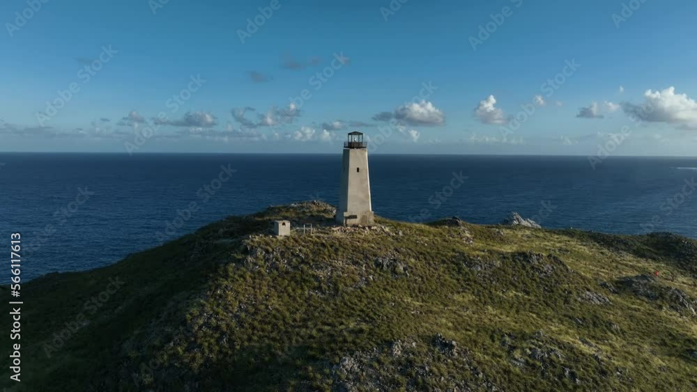 Early morning aerial view of the lighthouse on top of the hill. Gran Roque Island in Los Roques Archipelago, Venezuela. Early morning aerial view of the lighthouse on top of the hill. Gran Roque Island in Los Roques Archipelago, Venezuela.