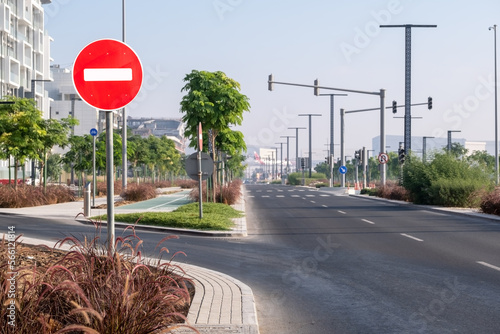 View of an empty beautiful street highway with entry prohibited traffic sign in the city