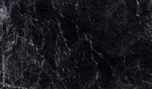 Black marble background. Natural stone wallpaper.