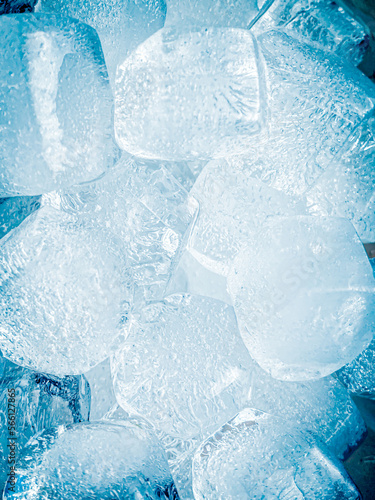 Ice cubes background, ice cube texture or background It makes me feel fresh and feel good, In the summer, ice and cold drinks will make us feel relaxed, Made for beverage or refreshment business. © Charisia