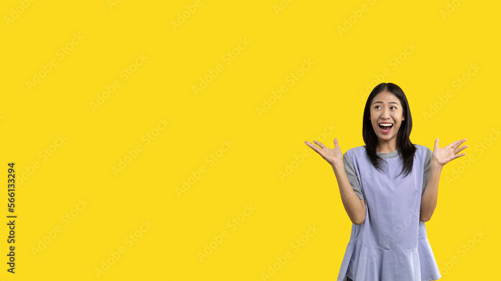Asian woman acting shocked or surprised isolated on a white background ...
