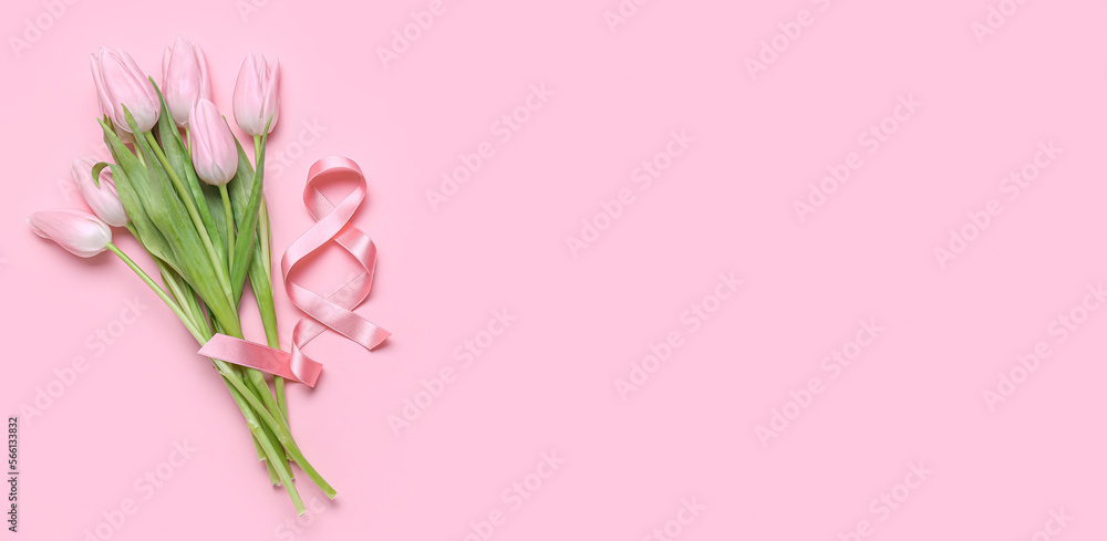 Bouquet of tulips and figure 8 on pink background with space for text. International Women's Day