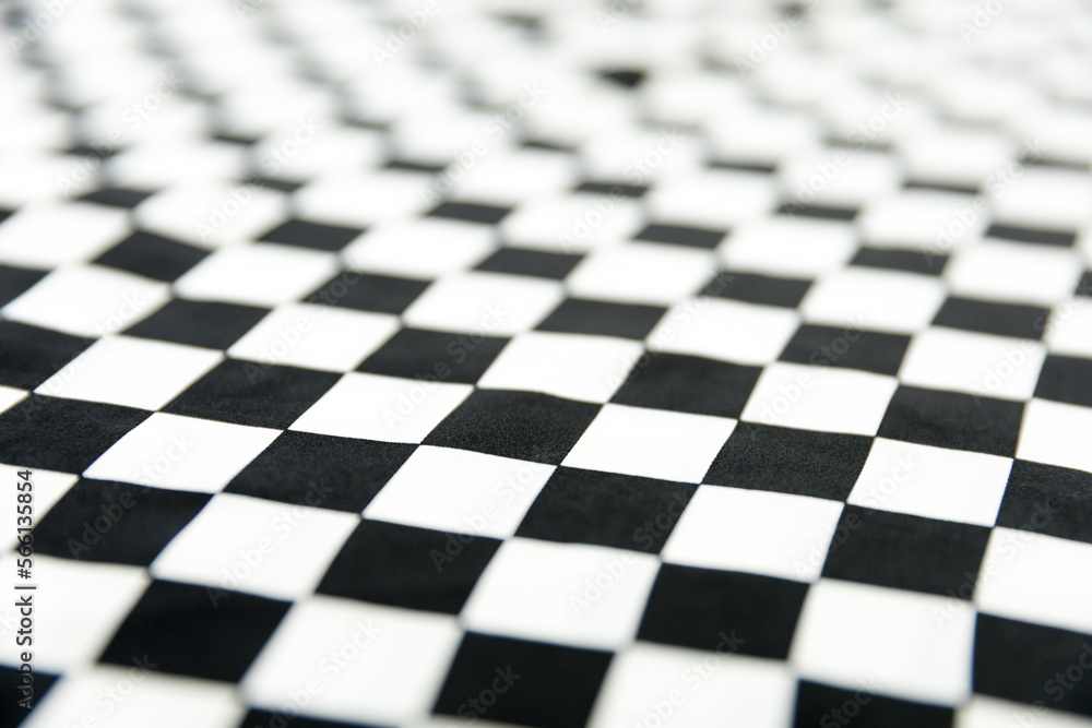 Blurred defocused black and white square and rhombus fabric pattern Blurred defocused black and white square and rhombus fabric pattern