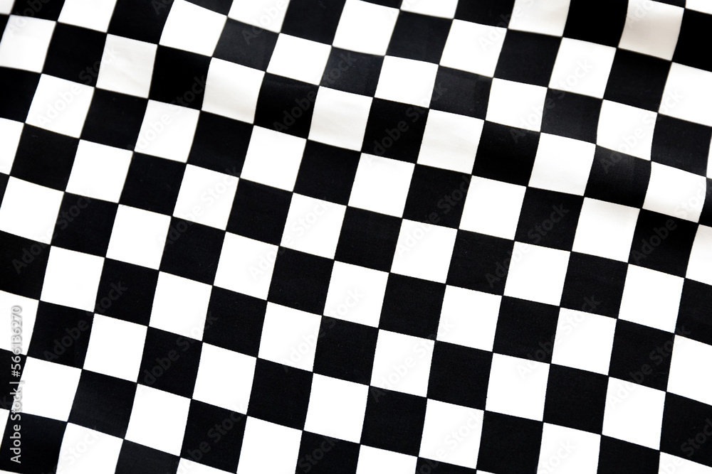 Fototapeta premium Blurred defocused black and white square and rhombus fabric pattern