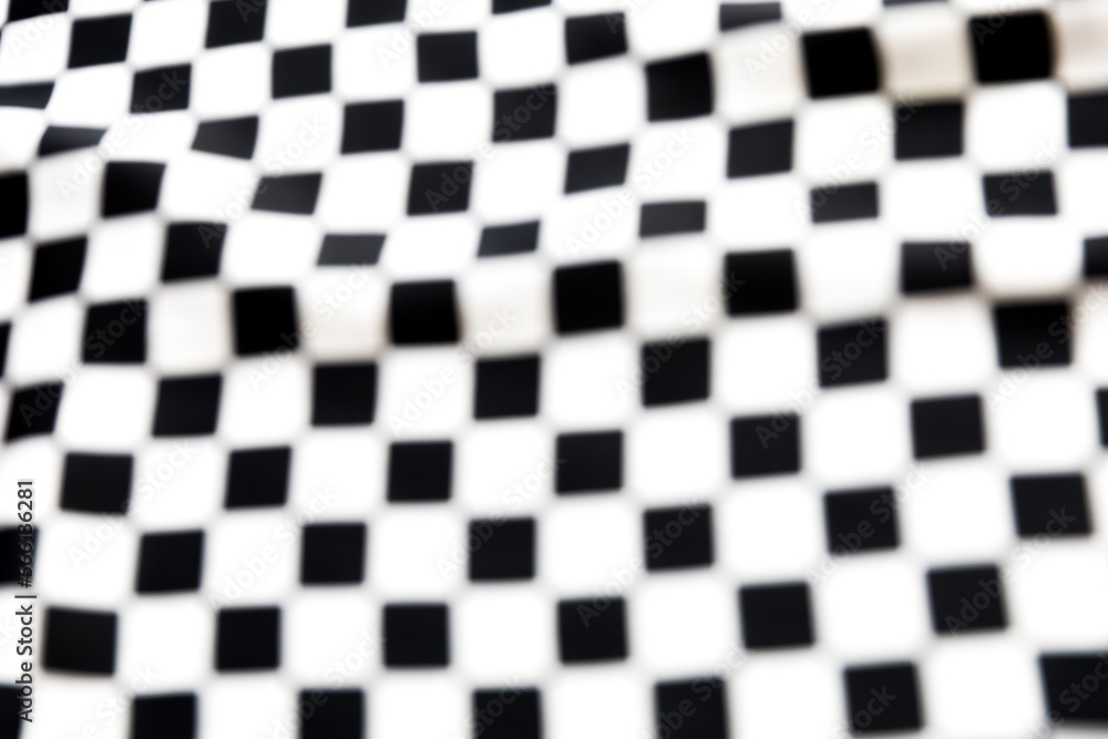 Fototapeta premium Blurred defocused black and white square and rhombus fabric pattern