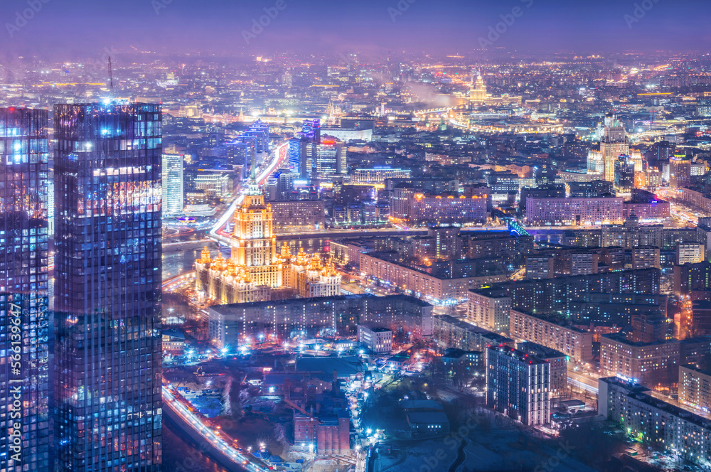 View of the city from the observation deck to skyscrapers in the light of night lights, Hotel  and the Ministry of Foreign Affairs, Moscow City