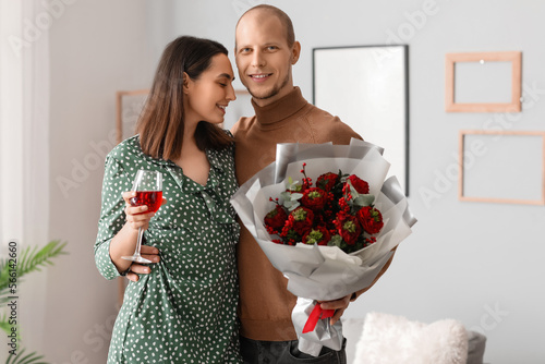 Young couple with bouquet o...