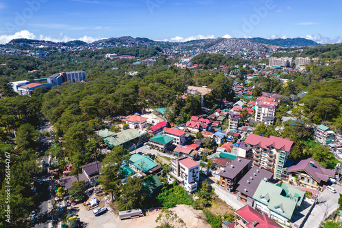 Fototapeta Naklejka Na Ścianę i Meble -  Baguio City, Philippines - Aerial of hotels and other lodging with Downtown Baguio in the distance.