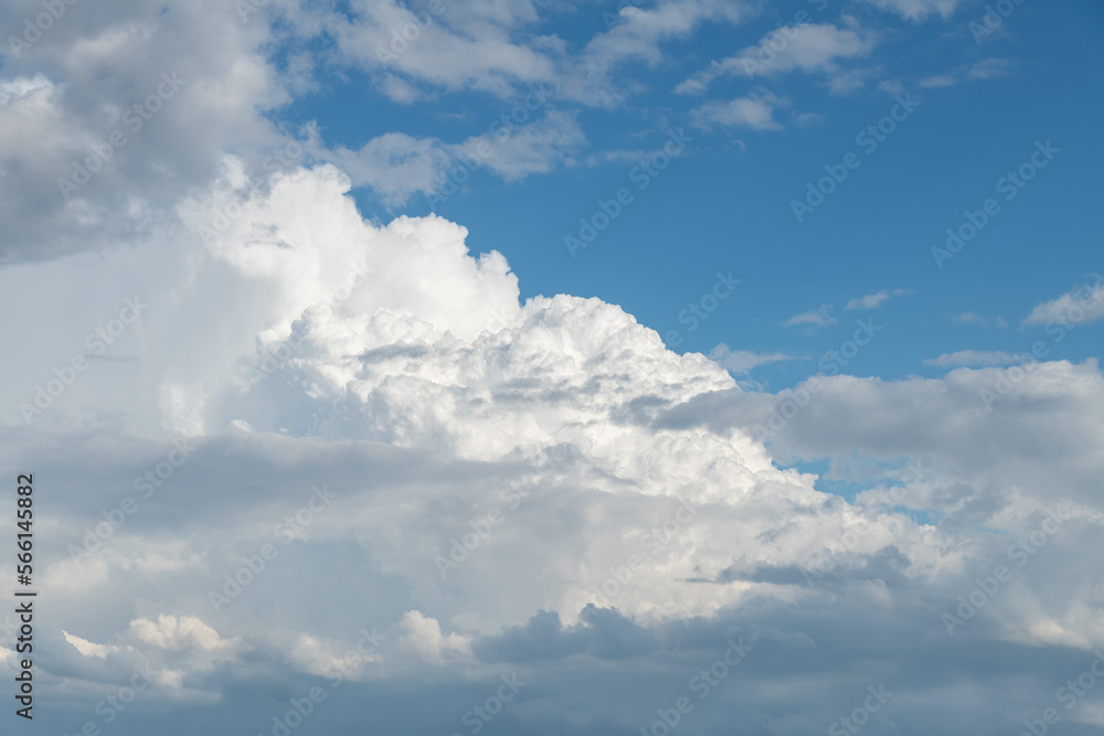 Cumulus Nimbus storm clouds with a blue sky. Cumulus Nimbus storm clouds with a blue sky.