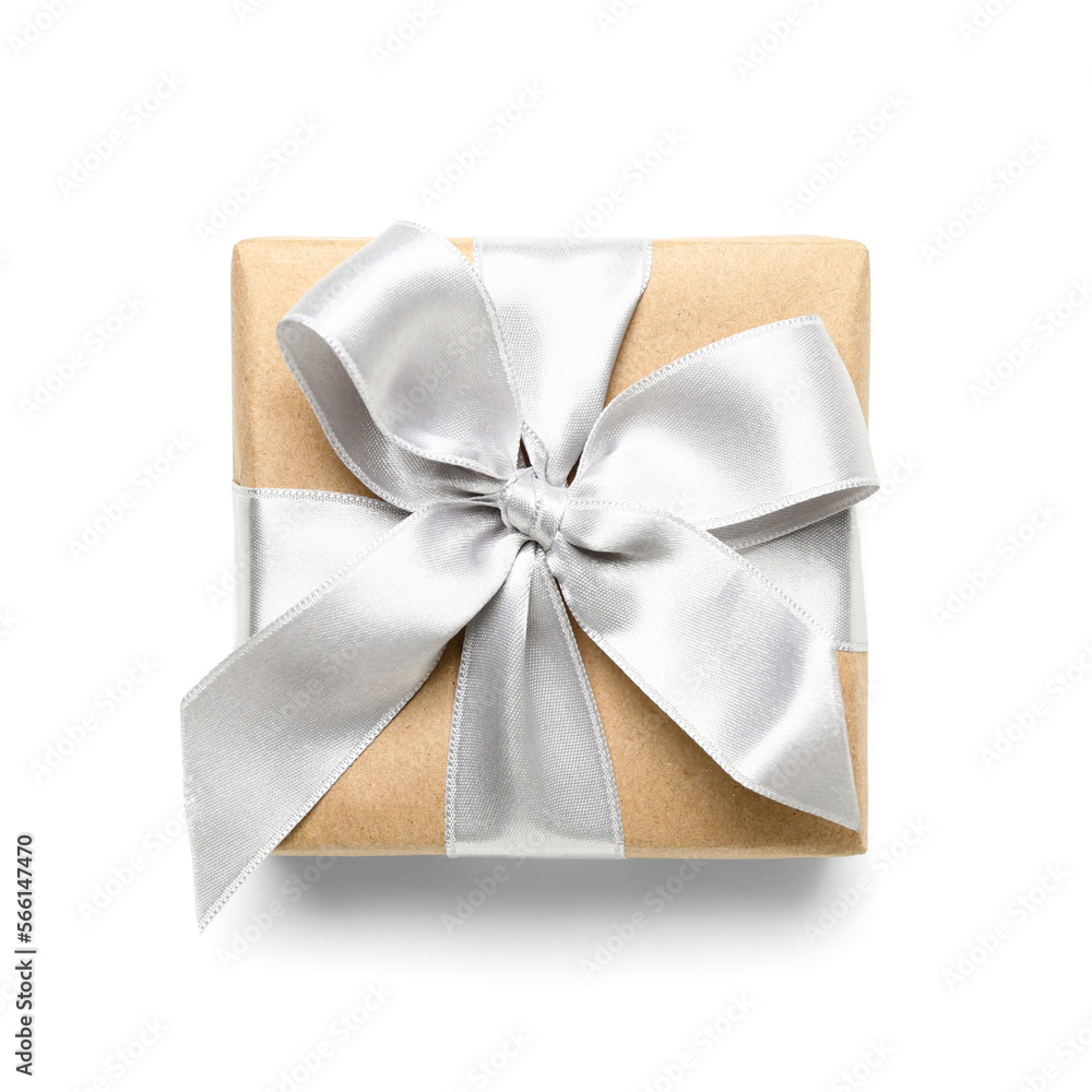 Fototapeta premium Gift box wrapped in craft paper with silk ribbon on white background