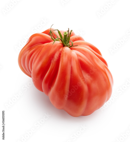 Fresh ripe vegetable tomato with drops of water close up isolated on white background