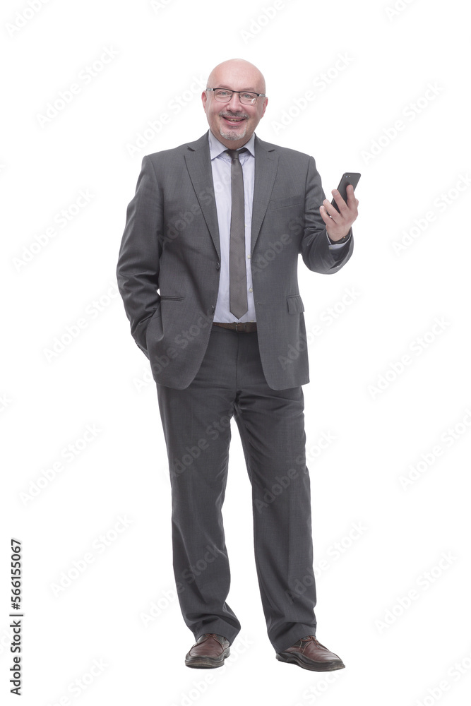 in full growth. business man with a smartphone. in full growth. business man with a smartphone.