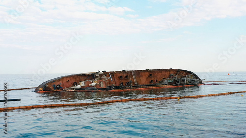 Wallpaper Mural Sunken drowned tanker ship near the aground. Broken rusty ship on the shallow water. Torontodigital.ca