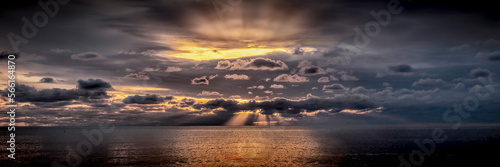 Tranquil view of dramatic sky at sunset, Pembrokeshire, Wales photo