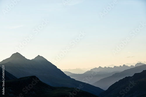 Austria, Tyrol, Mountain peaks at foggy dawn photo