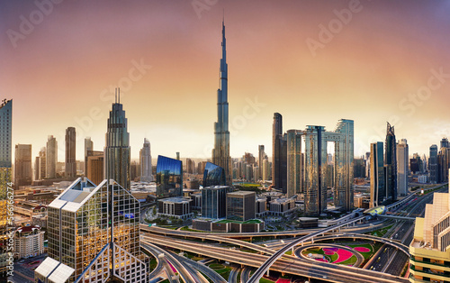 Dubai skyline at sunset with Burj Khalifa - aerial view, United Arab Emirates