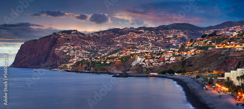 Funchal city at night near Praia Formosa beach, Madeira - Portugal photo