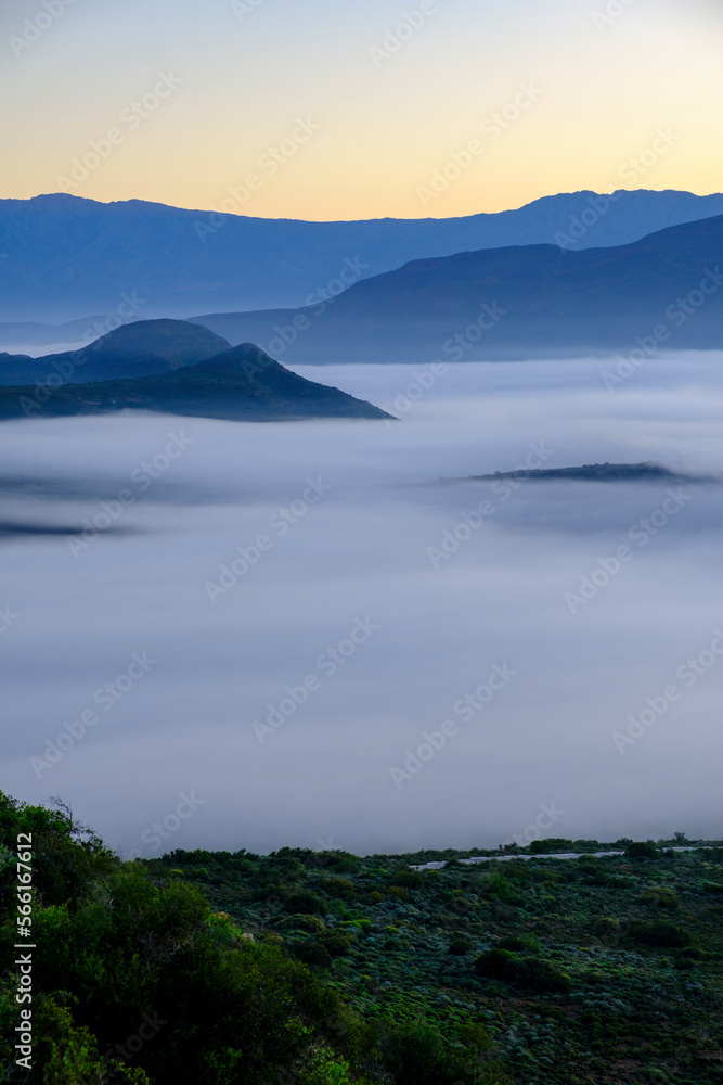 Scenic view of Langeberg mountains with fog Scenic view of Langeberg mountains with fog