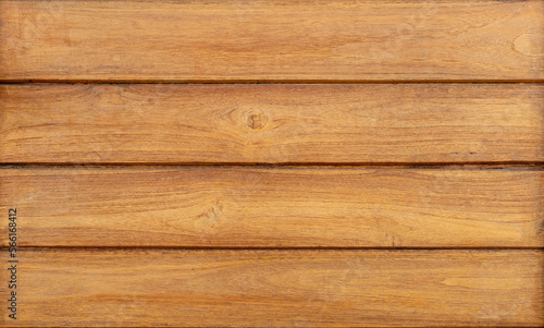 Natural rustic teak wood wall surface background for vintage design purpose.