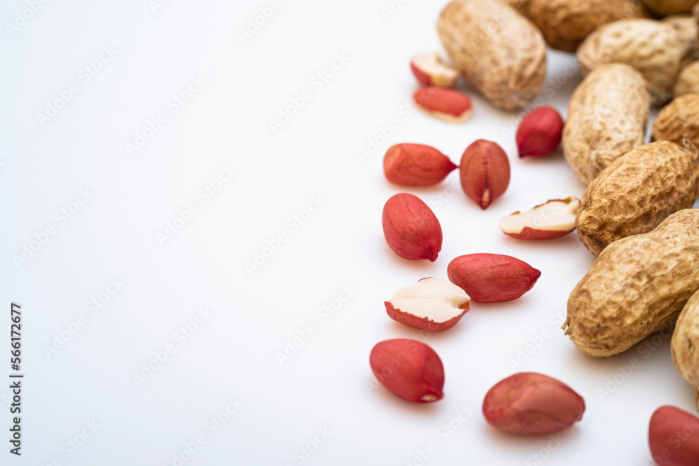 Peanut.
roasted nuts,
Dried peanuts crushed into many pieces close-up on a white background Peanut.
roasted nuts,
Dried peanuts crushed into many pieces close-up on a white background