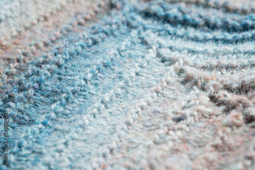 Knitted background. Knitted fabric texture, pure sheep wool, color gradient. © TanyaJoy
