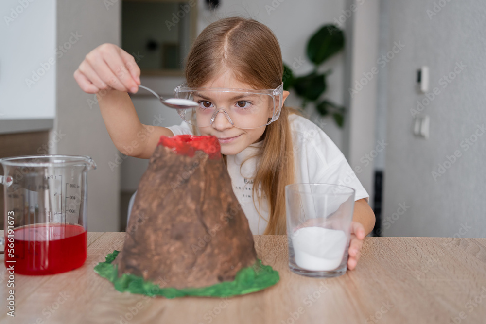 Kid science experiment of volcano or baking soda and vinegar volcano