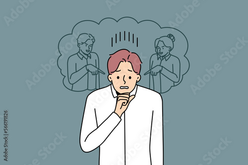 Unhappy young man feel pressure from colleagues pointing and scolding. Upset male feel distressed suffer from bullying at workplace. Vector illustration. 
