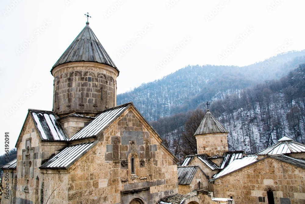 Christian church in the forest. Old monastery complex. Apostolic church - obrazy, fototapety, plakaty 