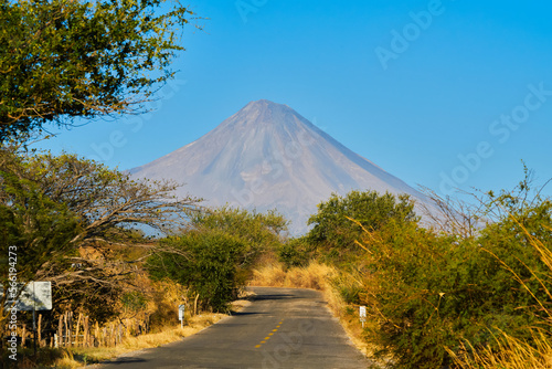 Colima volcano on a clear day with blue skies