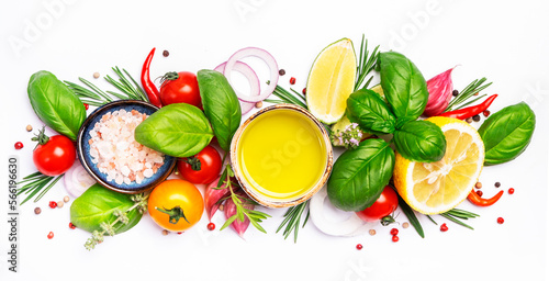 Fototapeta Naklejka Na Ścianę i Meble -  Fresh spicy herbs and spices for mediterranean diet. Banner. Tomato, green basil, olive oil, garlic and other. Vegan healthy food on white background. Cooking concept, top view, copy space