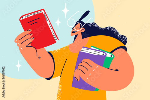 Smiling girl in glasses holding books 