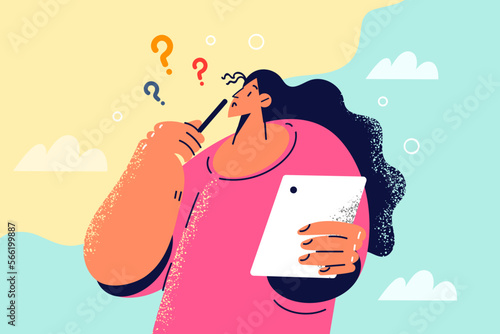 Pensive woman work on tablet think of solution 