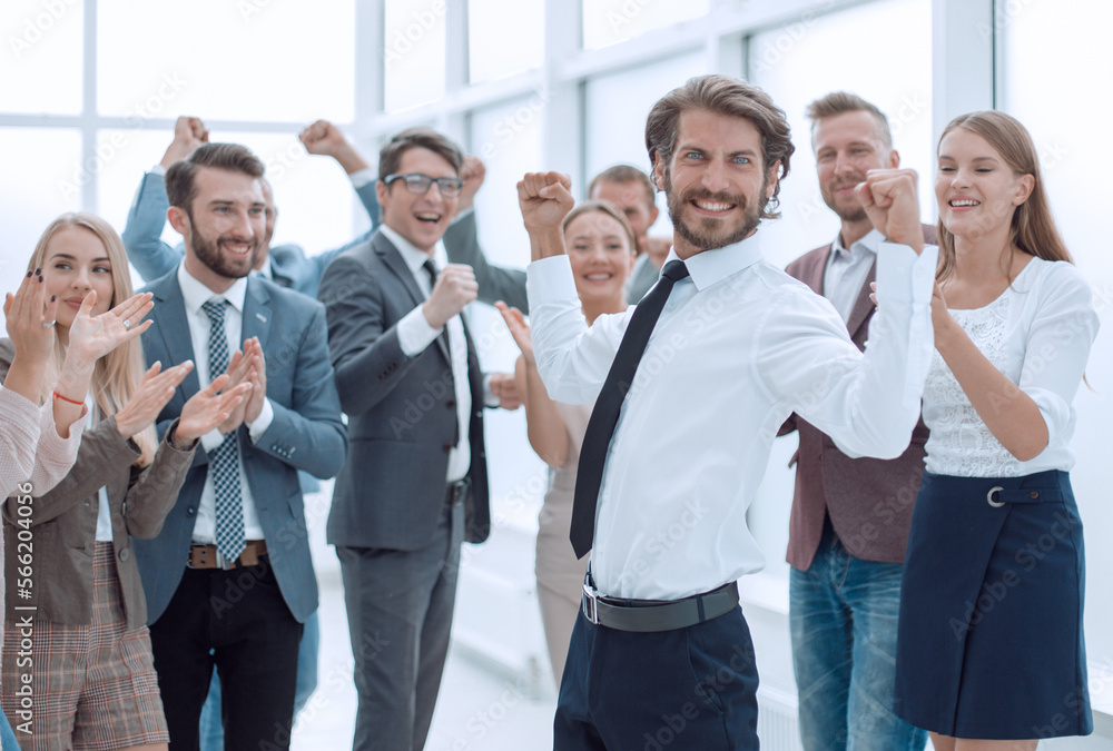 happy young businessman on business team background. happy young businessman on business team background.