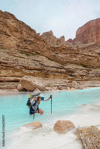 Woman wading in Colorado River, Grand Canyon, Arizona, USA photo