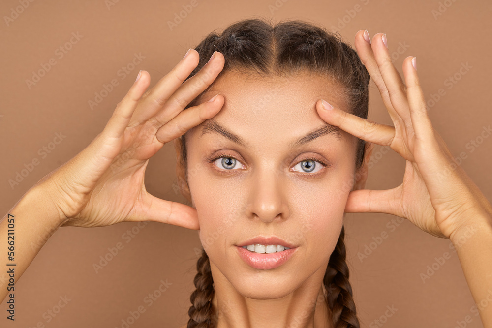 Fototapeta premium Natural beauty. Beautiful young woman. Smooth skin care concept.